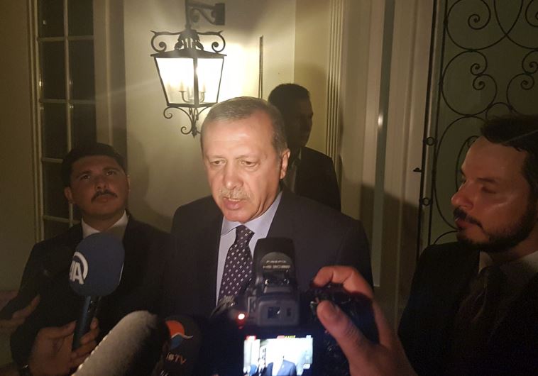 Turkish President Tayyip Erdogan speaks to media in the resort town of Marmaris, Turkey