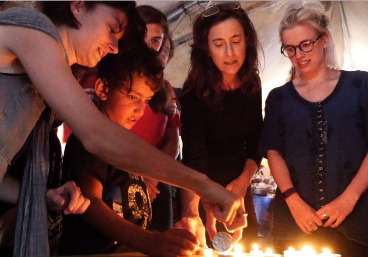 Jewish peace activists light Shabbat candles in Sussiya