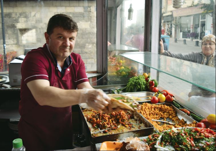 Making chickpea wraps in Gaziantep in southeast Turkey