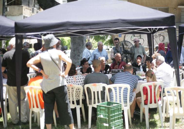 SOME OF THE 500 Israelis and Palestinians who met in Tel Aviv on Friday for a ‘public negotiating congress’ on the Palestinian-Israeli conflict. (