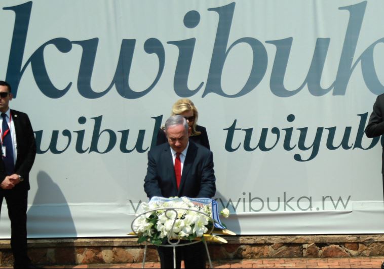 PRIME MINISTER Benjamin Netanyahu lays a wreath as Rwandan President Paul Kagame and First Lady Jeannette Kagame watch at the Genocide Museum near Kigali, Rwanda, earlier this month
