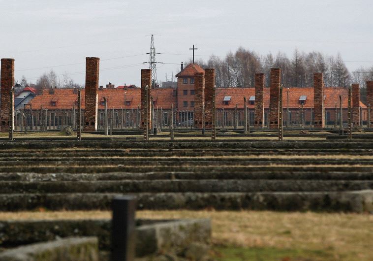 A CROSS is seen in the German death camp Auschwitz II Birkenau.