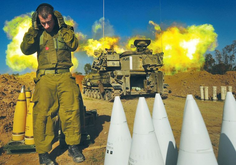  A SOLDIER from the recently established Flame of Fire Brigade participates in a live-fire drill in southern Israel last week.