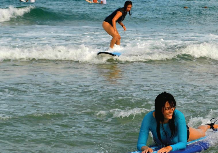 Maya Surf students practice catching a wave