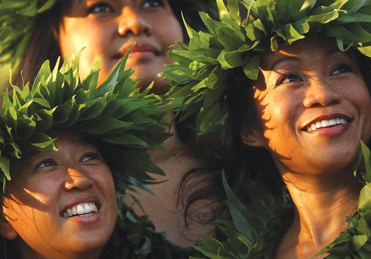 DANCERS PERFORMING at the Waikiki Shell on Waikiki Beach in Honolulu, Hawaii.