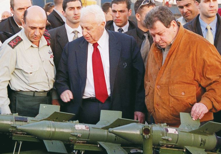 FORMER LEADERS (from left) chief of staff Shaul Mofaz, prime minister Ariel Sharon, and defense minister Binyamin Ben- Eliezer examine Sagger anti-tank missiles captured on the Palestinian arms ship ‘Karine A’ in January 2002.