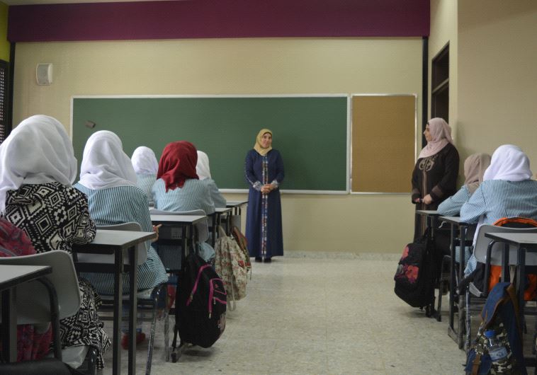 Students in classroom at Aqqaba Secondary Girls' School.
