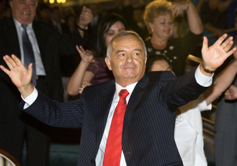 Uzbekistan's President Islam Karimov dances during Independence Day celebrations in Tashkent