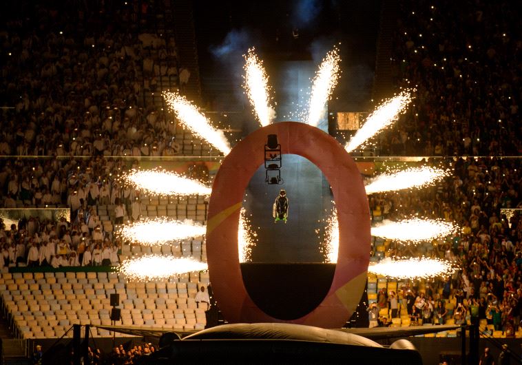 Aaron Wheelz, an extreme wheelchair athlete, goes down a MegaRamp and tears through the panel marking the start of the Opening Ceremony of the Rio 2016 Paralympic Games at the Maracana Stadium in, Rio de Janeiro, Brazil