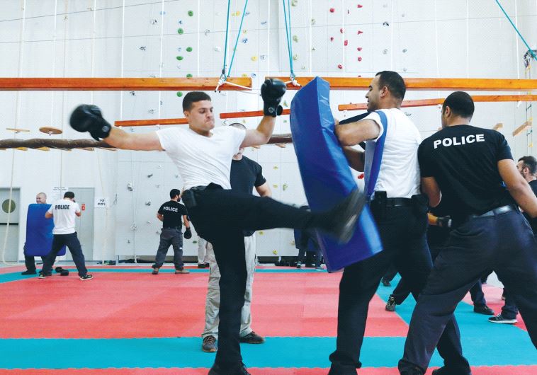 AN ARAB RECRUIT takes part in training at the Israel Police Academy in Beit Shemesh on August 24