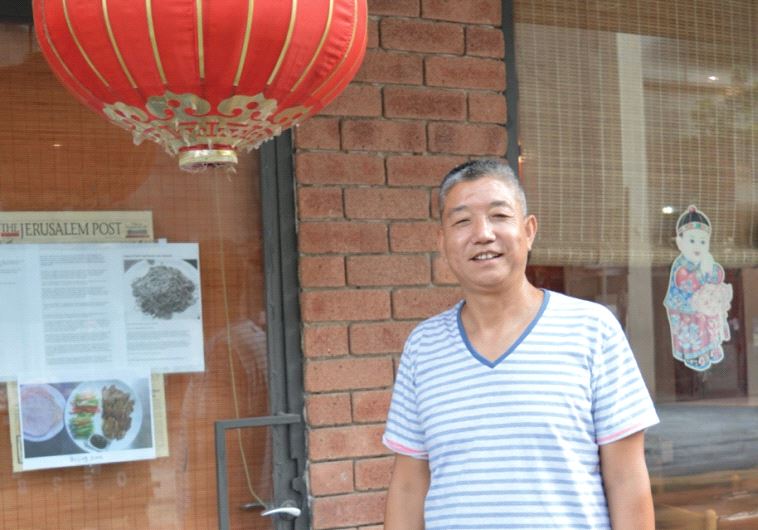 Yaakov Wang welcomes guests to an incomparable culinary experience at the Chinese Wall restaurant in Tel Aviv