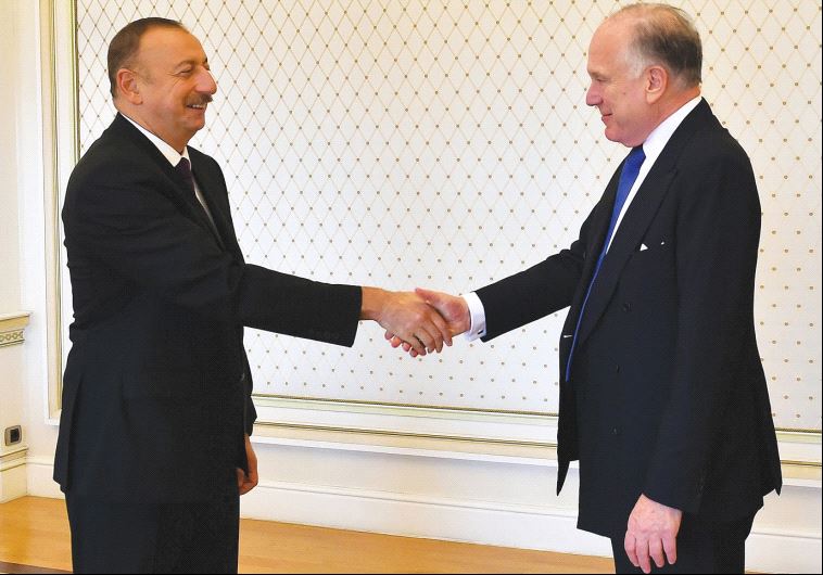 PRESIDENT ILHAM ALIYEV of Azerbaijan (left) welcomes WJC president Ronald S. Lauder.