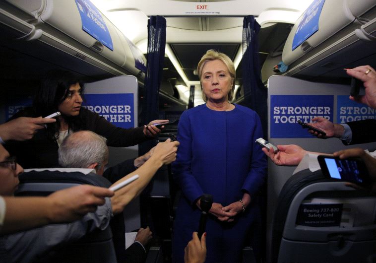 Democratic nominee Hillary Clinton talks to reporters about the explosion in Chelsea neighborhood of Manhattan, New York, as she arrives at the Westchester County airport in White Plains, U.S., September 17, 2016