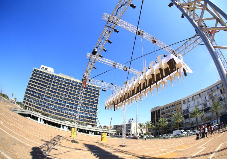 Latet's 'Unattainable Meal' exhibit in Rabin Square in Tel Aviv