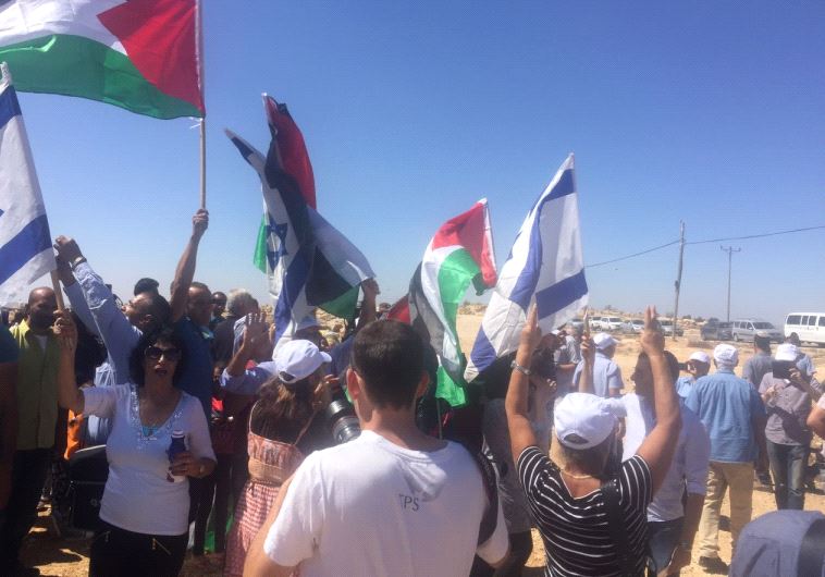 Right-wing activists and Palestinians clash at Sussiya.
