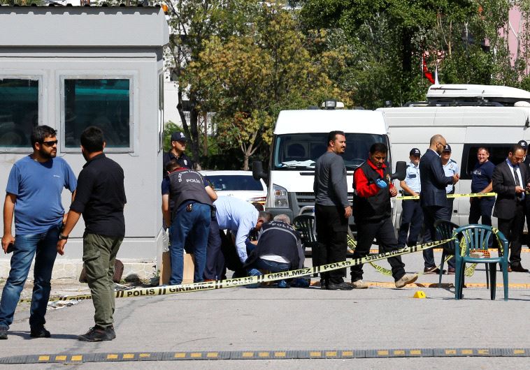 Police forensic experts examine in front of the Israeli Embassy in Ankara, Turkey, September 21, 2016