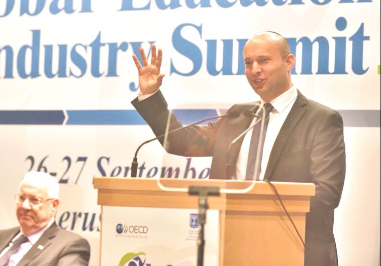 EDUCATION MINISTER Naftali Bennett speaks at the OECD global summit in Jerusalem yesterday as President Reuven Rivlin looks on.