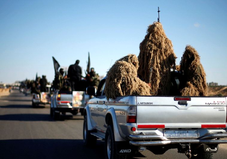 Arab militants parade in Rafah. 