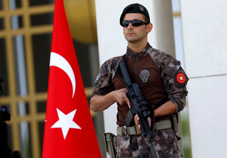 A Turkish special forces police officer guards the entrance of the Presidential Palace in Ankara, Turkey, August 5, 2016