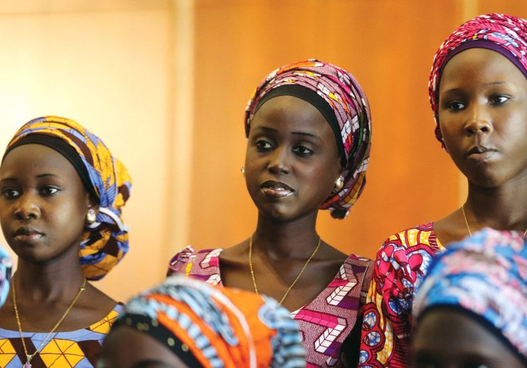Some of the 21 Chibok schoolgirls released by Boko Haram look on during their visit to meet President Muhammadu Buhari in Abuja, Nigeria, on October 19
