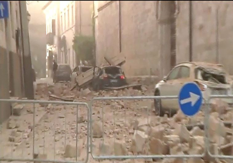 Destroyed cars under rubbles after an 6.6 magnitude earthquake on October 30, 2016 in Norcia