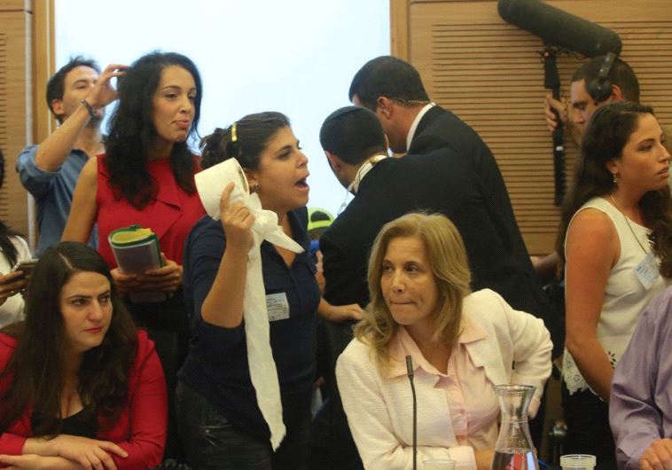 PROTESTERS FROM the North brandish toilet paper at the Knesset yesterday.