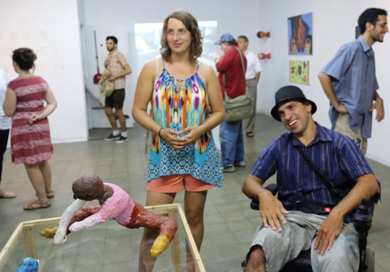 Clil (left) and Sharon exhibit the joint project they created through Dialogue Through Art, a SHEKEL-Bezalel Academy of Arts and Design program
