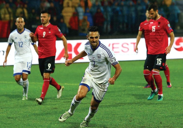 Israel captain Eran Zahavi celebrates after scoring the opener in last night’s win at Albania in 2018 World Cup qualification.