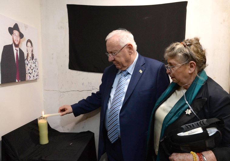 Rivlin lights memorial candle at Mumbai Chabad House
