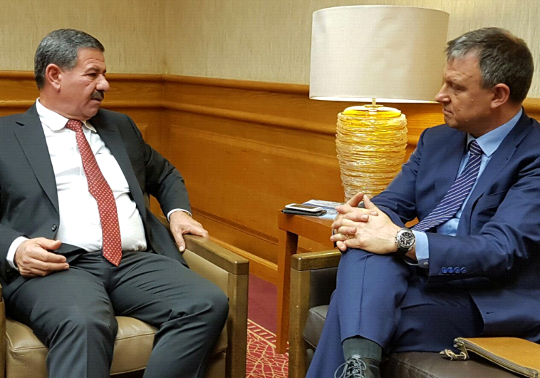 Zionist Union MK Erel Margalit meeting with Jordanian Minister Saad Abu Hammour.