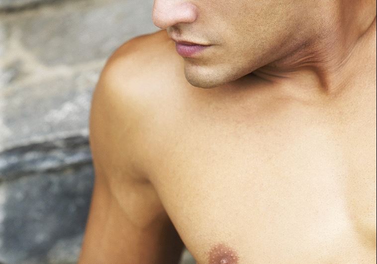 Shirtless man [illustrative]