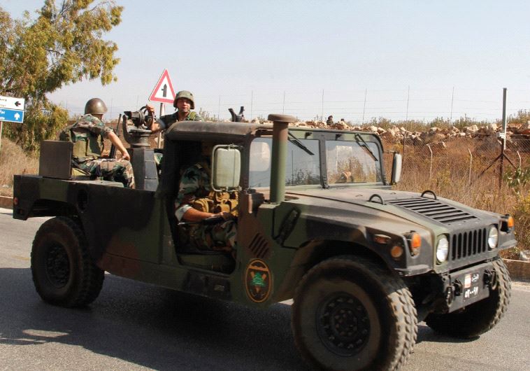 LEBANESE SOLDIERS drive near the border with Israel in Kafr Kila, in October. Israel has used its ability to operate in the skies over Syria to prevent weapons transfers to Hezbollah in Lebanon from the Syrian regime.