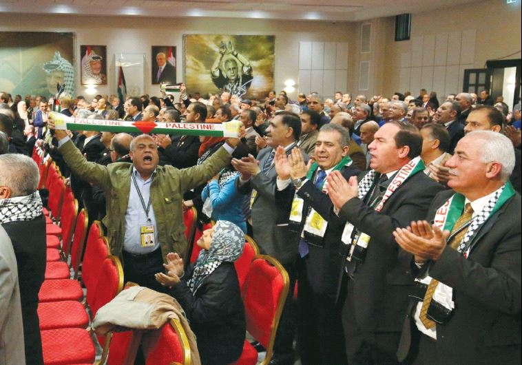 PARTICIPANTS IN the Fatah congress in Ramallah clap and cheer before a speech by Palestinian Authority President Mahmoud Abbas.