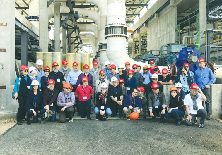 PARTICIPANTS IN the JNF’s tour of water management solutions pose during a visit on Monday to the Sorek desalination plant near Rishon Lezion, the largest such facility in the world.