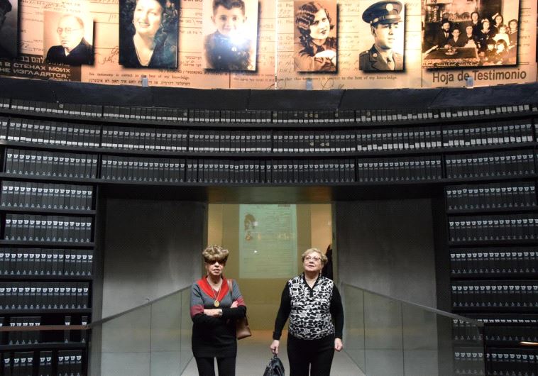 Rywka Borenstein Patchnik and Fania Band Blakay walking arm-in-arm in Yad Vashem's Hall of Names