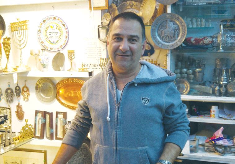 SHMUEL GHATAN, a Jerusalem store owner, says he would like to see the US Embassy moved to the capital.