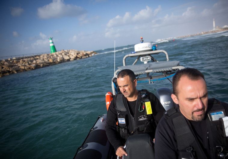 Erman Skyman, (R) the Superintendent of the Tel Aviv police coastal patrol unit and Shlomo Maman, 44, an officer. 
