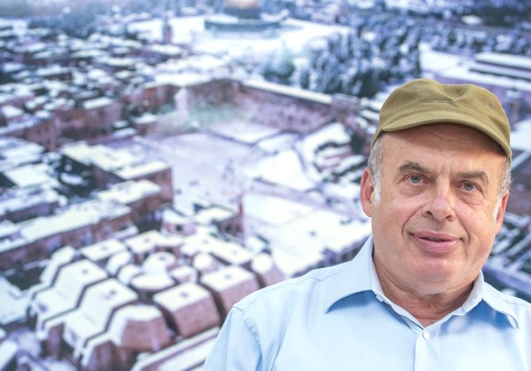 NATAN SHARANSKY at his Jewish Agency office in Jerusalem. A picture of the Kotel hangs on the wall behind him.