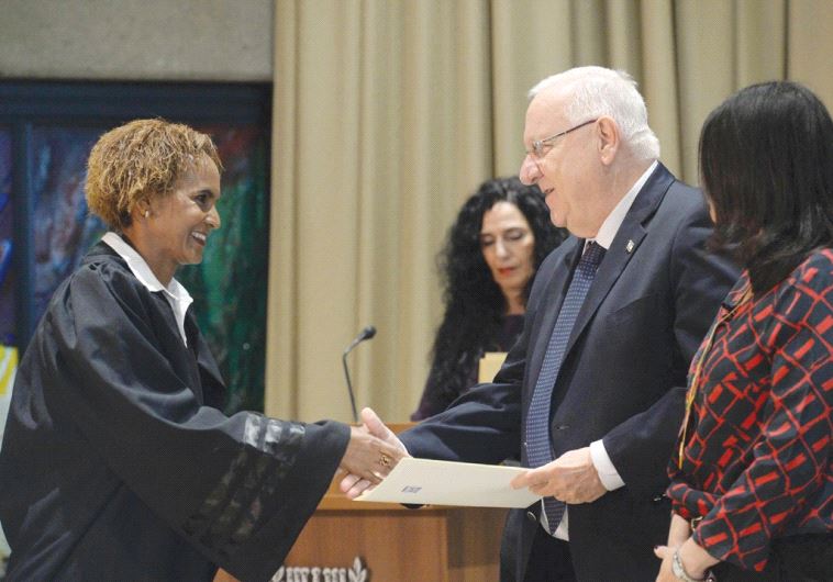 NEWLY APPOINTED Judge Ednaki Sebhat Haimowitz shakes hand with President Reuven Rivlin yesterday at the President’s Residence in Jerusalem.