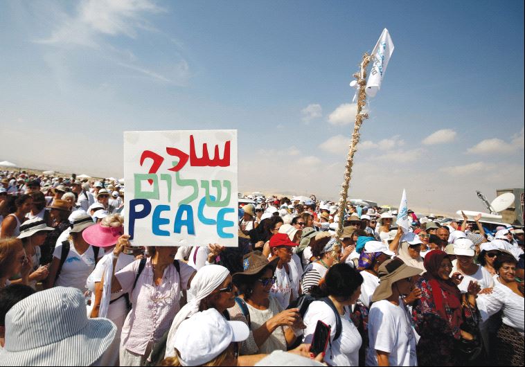 PRO-PEACE DEMONSTRATORS take part in a march in October. The author argues that Israel needs to concentrate on making peace with the Palestinians.