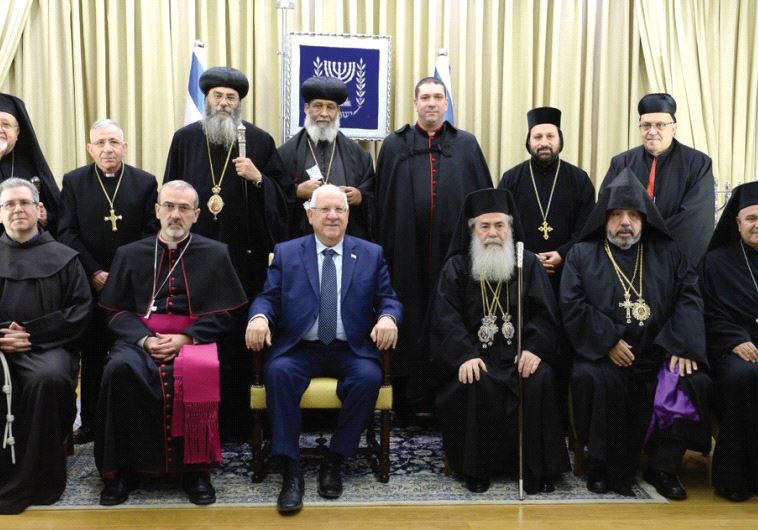 PRESIDENT REUVEN Rivlin assembles leaders of Christian communities for a traditional group photo at his annual reception marking the civil new year