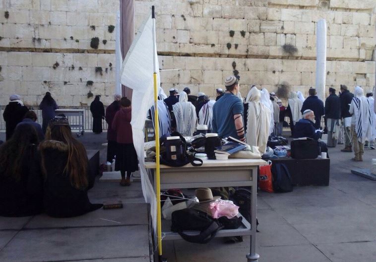 An impromptu Orthodox prayer service at the pluralist section of the Western Wall in Jerusalem.