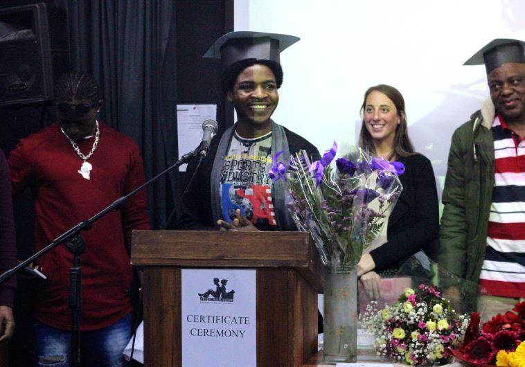 Gasim Ali, 24, gave a speech Wednesday night after accepting his graduation diploma 