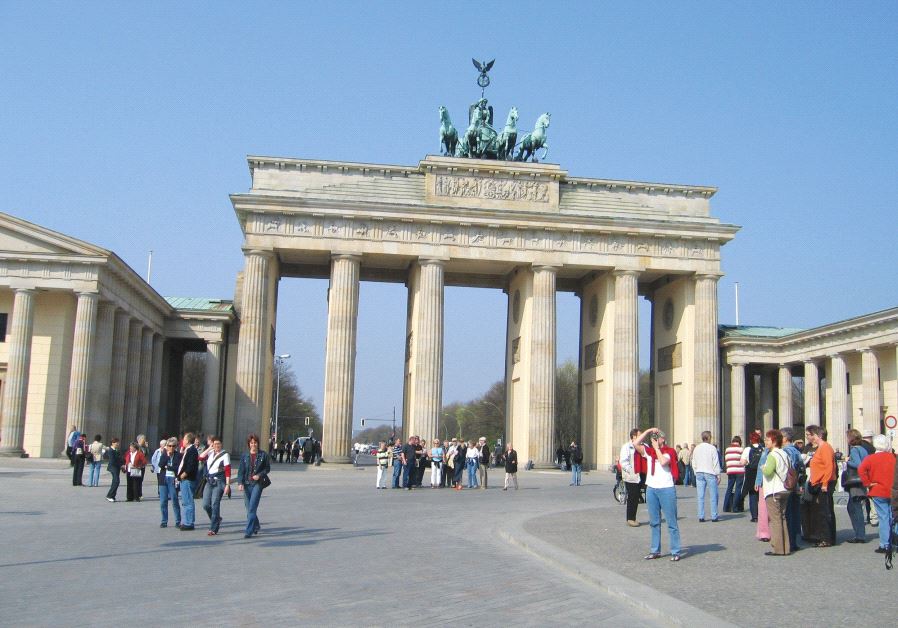The Brandenburg Gate, the stark, scarred archway in Berlin, Germany