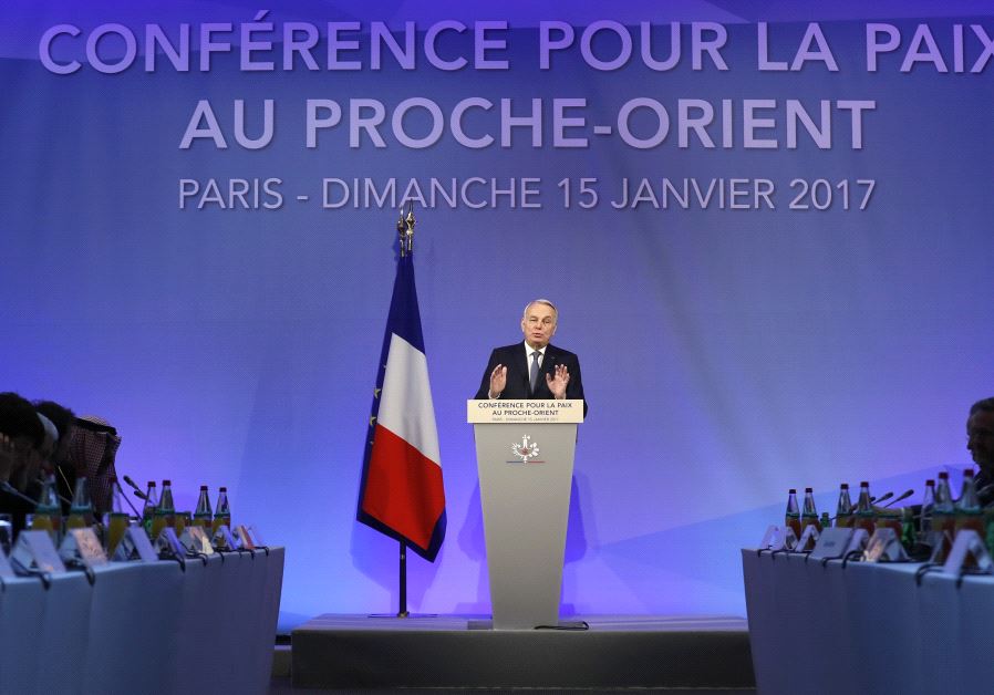 French Minister of Foreign Affairs Jean-Marc Ayrault addresses delegates at the opening of the Mideast peace conference in Paris, January 15, 2017