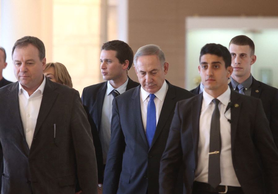 PRIME MINISTER Benjamin Netanyahu walks to a Likud faction meeting in the Knesset.