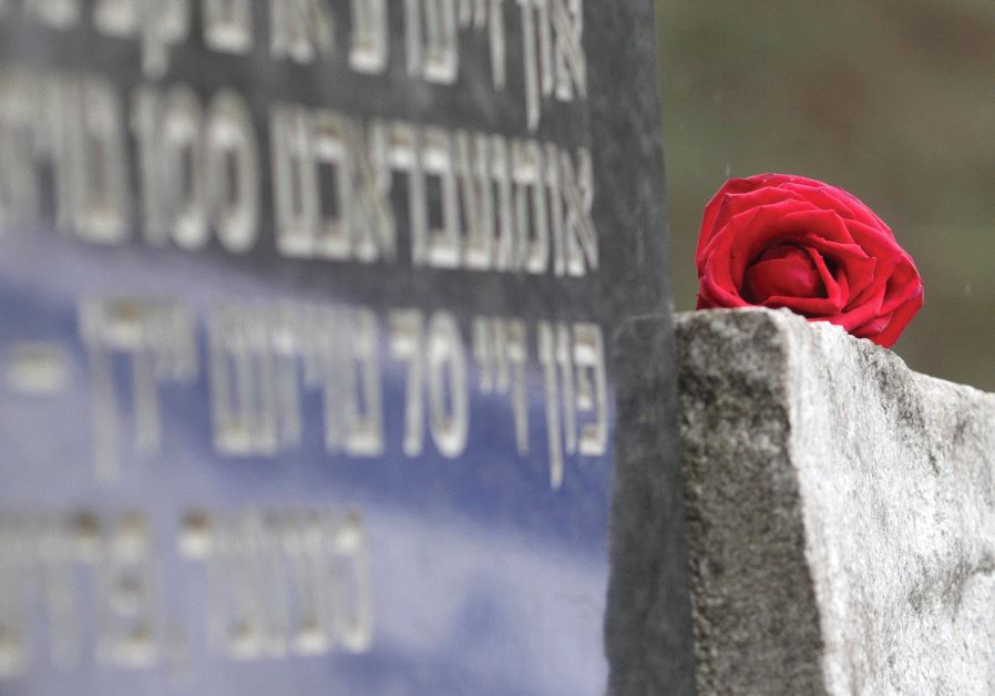 A RED ROSE is pictured during the March of the Living to honor Holocaust victims in Paneriai, near Vilnius, Lithuania, in 2012.