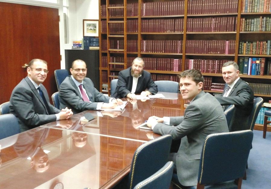 SEATED IN the office of Senator Orrin Hatch (R-UT) in Washington in 2016, from left: Egyptian Embassy officials Khaled El Menshawy and Muhammad Samir, Friedlander Group CEO Ezra Friedlander, and congressional staffers Doug Dynes and JC Cardinale