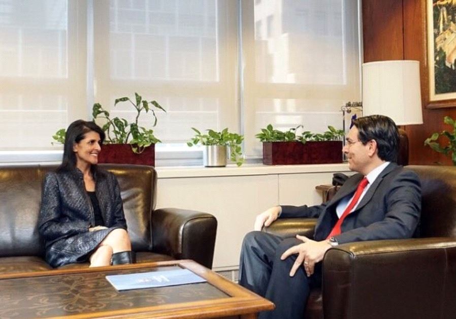Israeli Ambassador to the UN Danny Danon (R) meets with US Ambassador to the UN Nikki Haley in New York