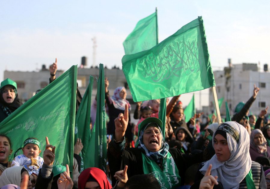 Palestinians take part in a rally marking the 29th anniversary of the founding of the Hamas movement, in Rafah in the southern Gaza Strip December 16, 2016